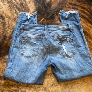 Buckle black distressed skinnies